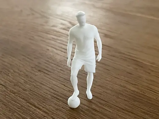 Kleiner Fußballer / Mann mit Fußball