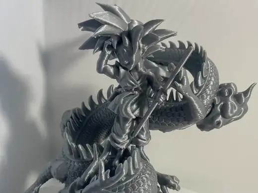 Goku kid on Shenron Dragon ball