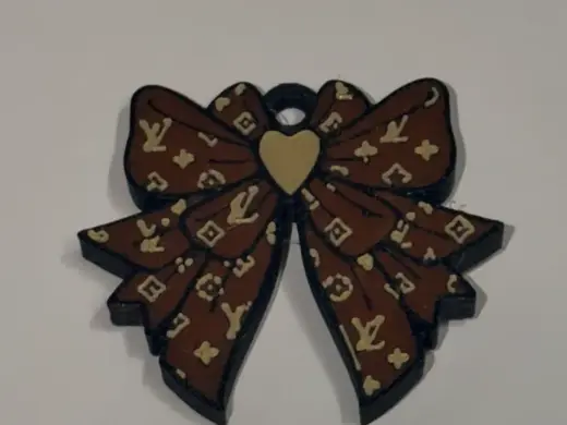 LV Embossed bow keychain