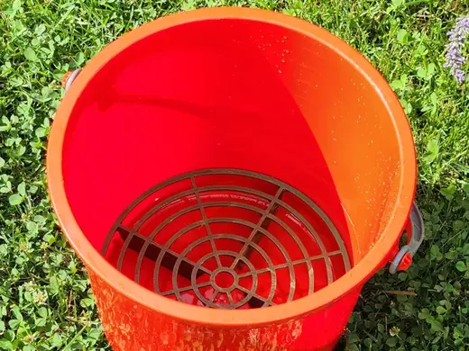 Grit guard for car wash bucket