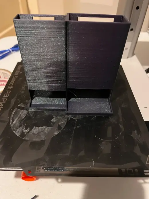 Battery holder for AA and AAA