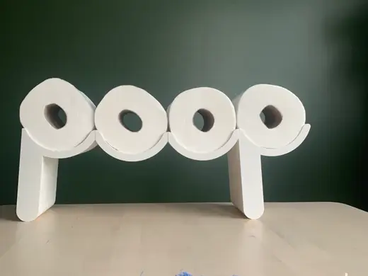 "Poop" toilet paper holder
