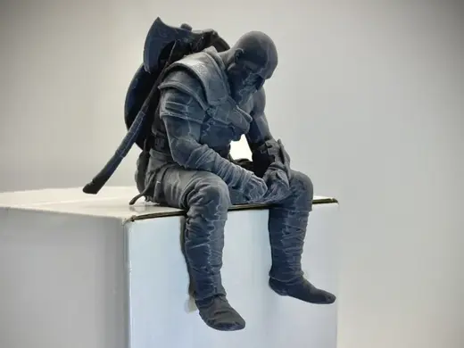 Sad Kratos Figurine sitting on a ledge!