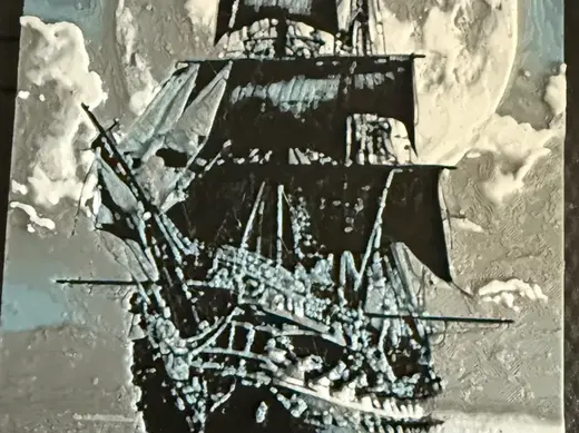 ship in full sails in moon light