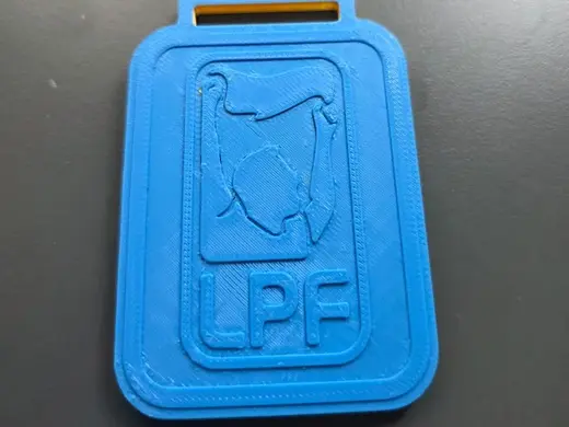 Medalla Apertura 2026 Belgrano LPF