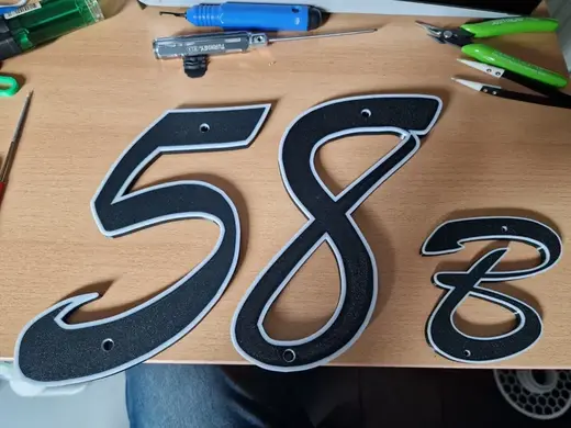 House numbers 1-10 AND A , B