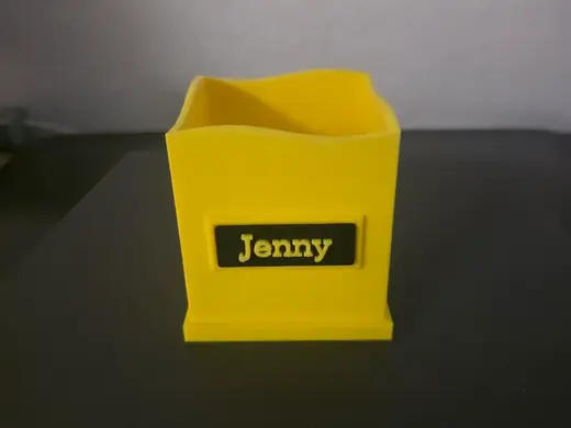 Pen holder with nameplate