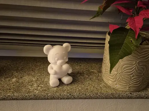 Teddy bear with a heart in its hands