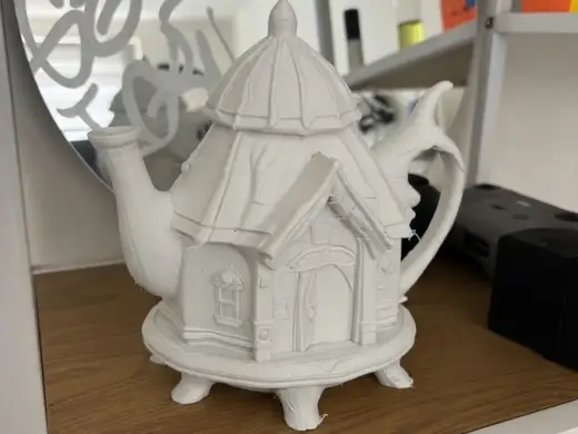 Whimsical Teapot Fairy House - A Magical Tea Time!