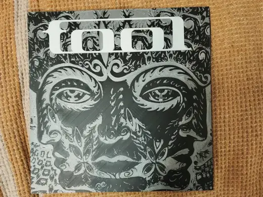 TOOL 10000 Days Album Cover with Logo