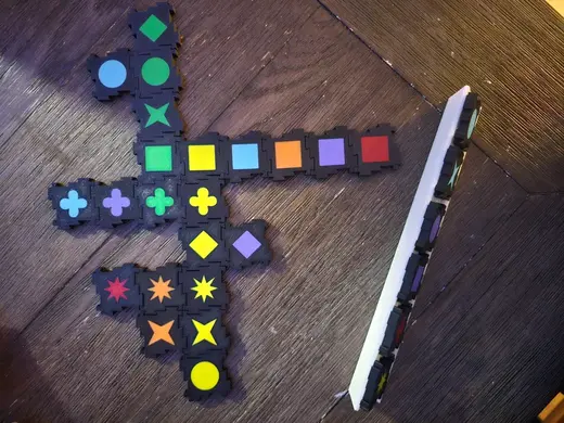 Qwirkle Set with Interconnected Pieces