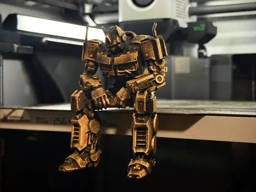 Sad Optimus Prime sitting on a ledge figurine!