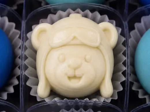 Ejetor de docinhos urso aviador