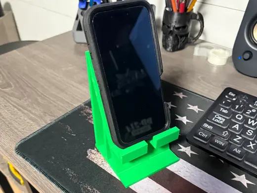 Phone holder with charging port