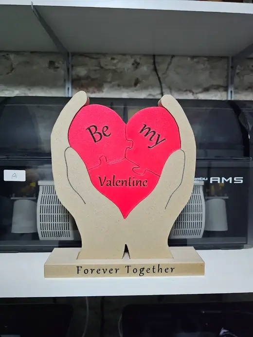 Valentine puzzle heart in hands