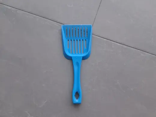 Pala para arenero de gatos
