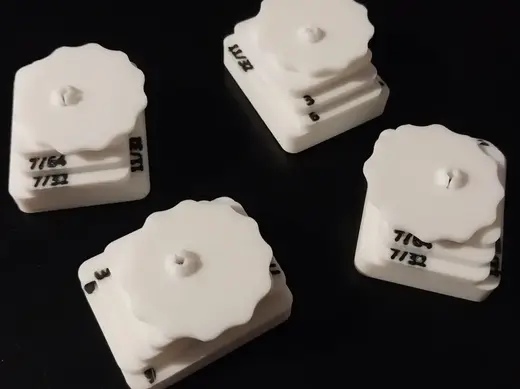 Magnetic hold down for laser cutter