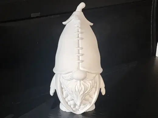 Garden Gnome Hiding in a Peapod