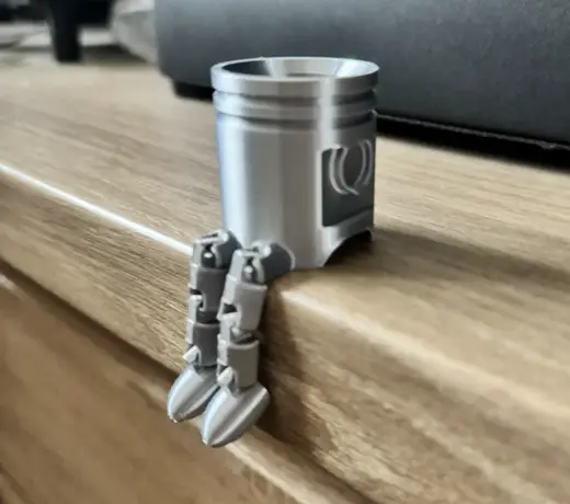Piston with articulated legs
