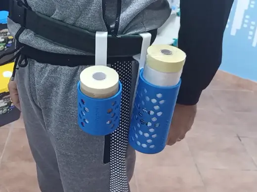 Round scotch tape reel holder with belt attachment