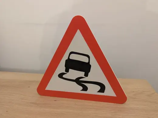 UK Road Sign - Slippery Road