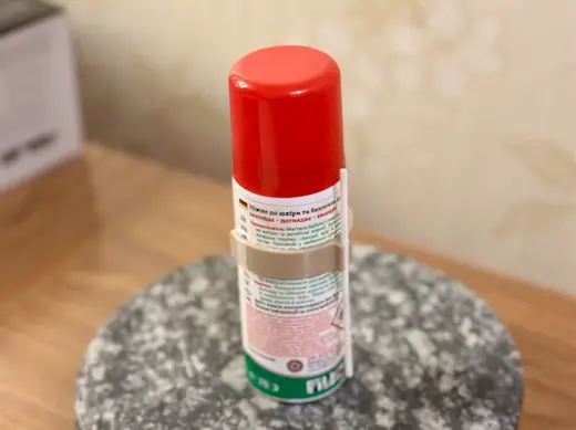 Tube clip for a small Ballistol can