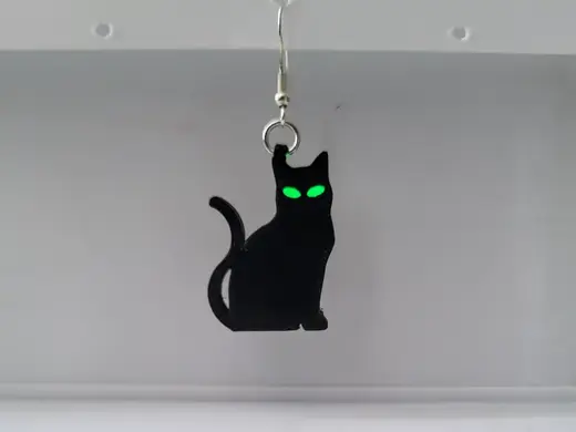 Halloween cats with glowing eyes