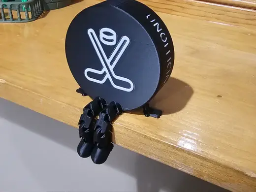 Articulated Hockey Puck Buddie
