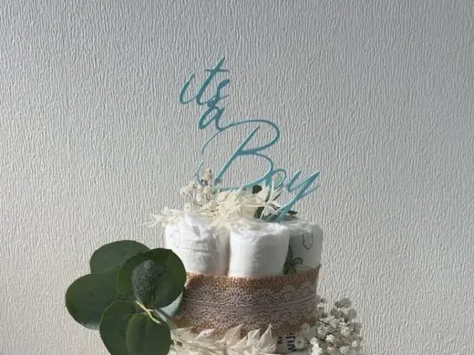 its a boy / girl Topper diaper cake