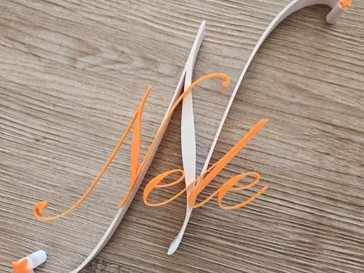Schriftzug Nele mit Sternen