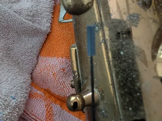 Needle caps, useful for woodwind needle springs