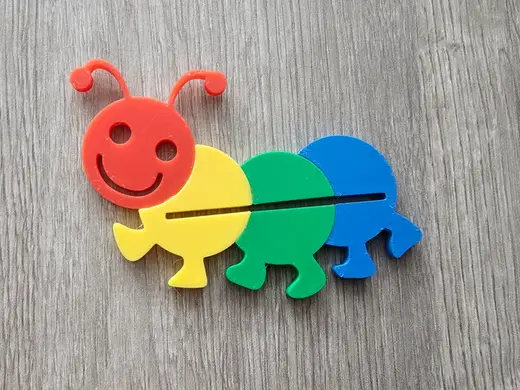 Bunte Raupe Tubenentleerer