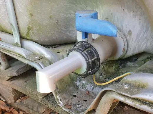 Water tank drain tube