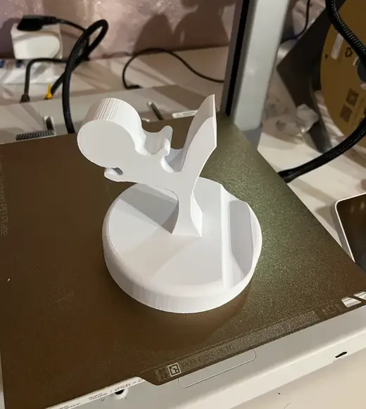 Support for a cellphone with a kung fu figure