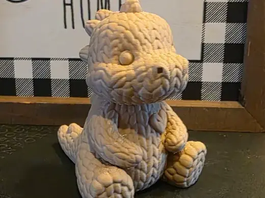 Cute Valentines Day Dinosaur Seated with Heart