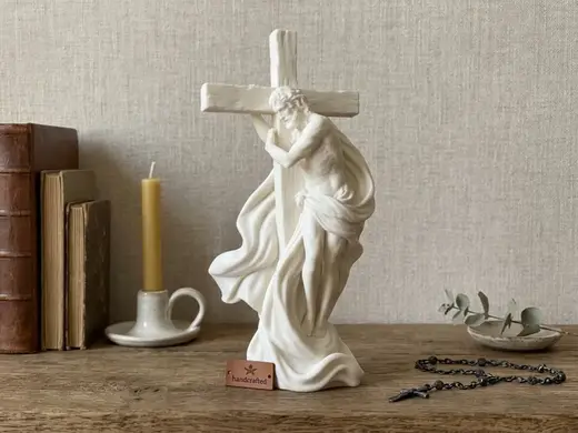 Christ Embracing the Cross Sculpture