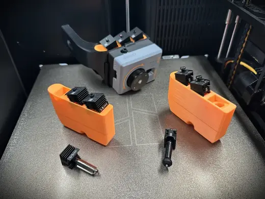 Nozzle Storage for MIM TPU Feed Assist System