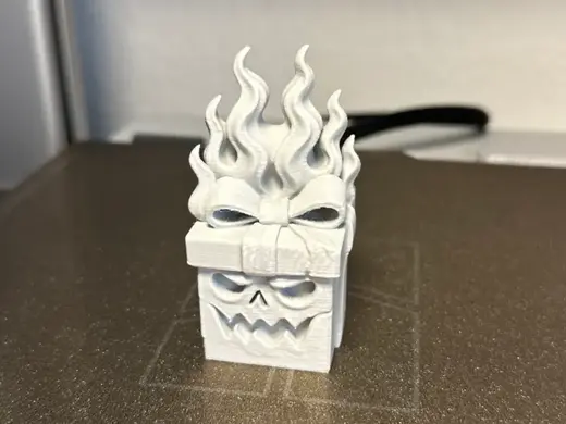 Evil Gift Box – Flaming Skull Present
