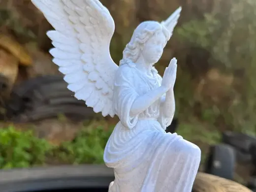 Kneeling Angel in Marble