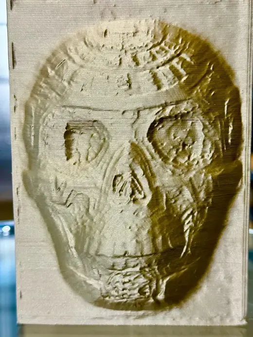 Gold Mayan Skull Relief Sculpture