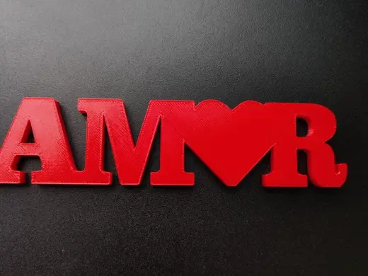 "AMOR 3D Lettering with Integrated Heart Design"