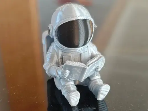 Luno cute astronaut reading customisable backpack