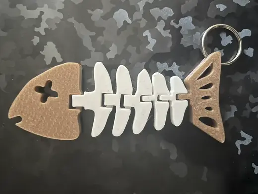 Articulated flexible fish bone keychain