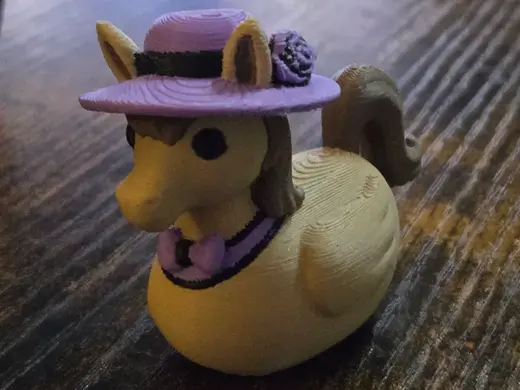 Horse duck with a Derby hat