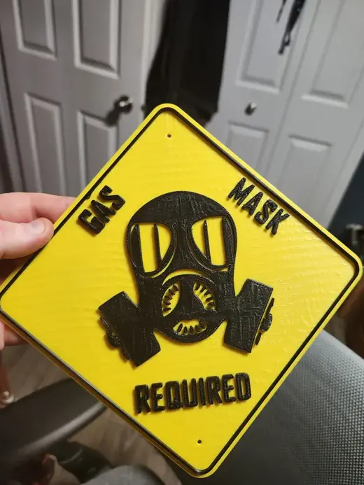 GAS MASK REQUIRED sign
