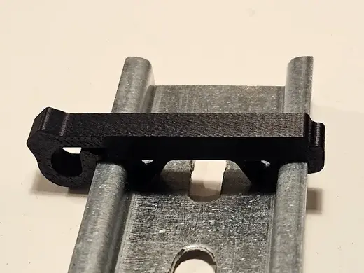 DIN rail stop, slim footprint