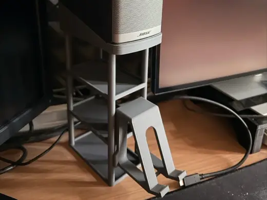 Modular raiser stand for desktop speakers