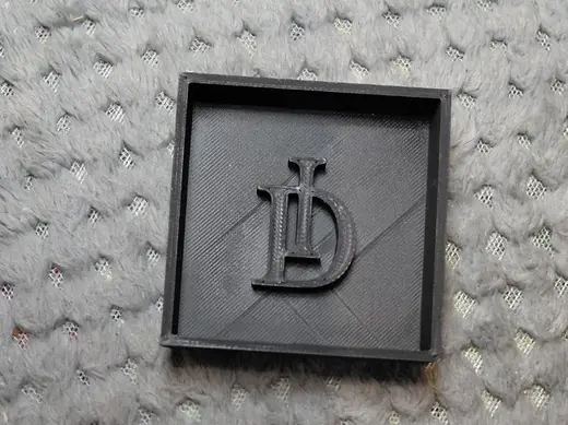 Little half a box. 60mm (12mm deep)