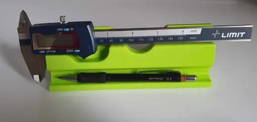 Desk organizer for caliper and pen