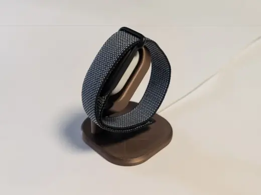 Fitbit air charging stand with cable routing